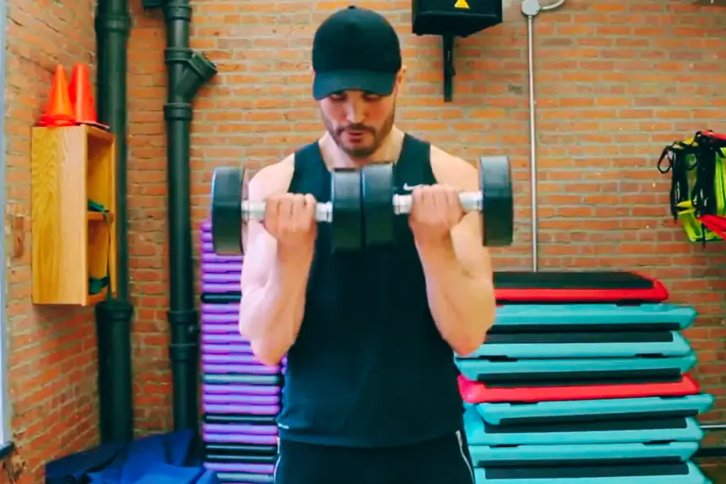 man doing Dumbbell Close Grip Curl